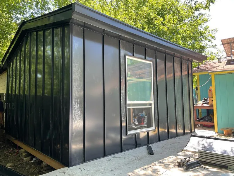 Black standing seam metal wall panels for Roof Inspection in Brighton