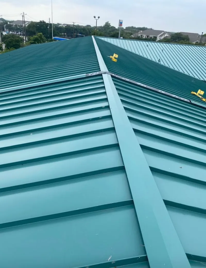 Green commercial metal roof ridge and valley for Metal Roof Repair in Brighton